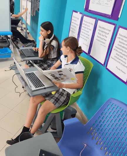 Students collaborating on technology projects