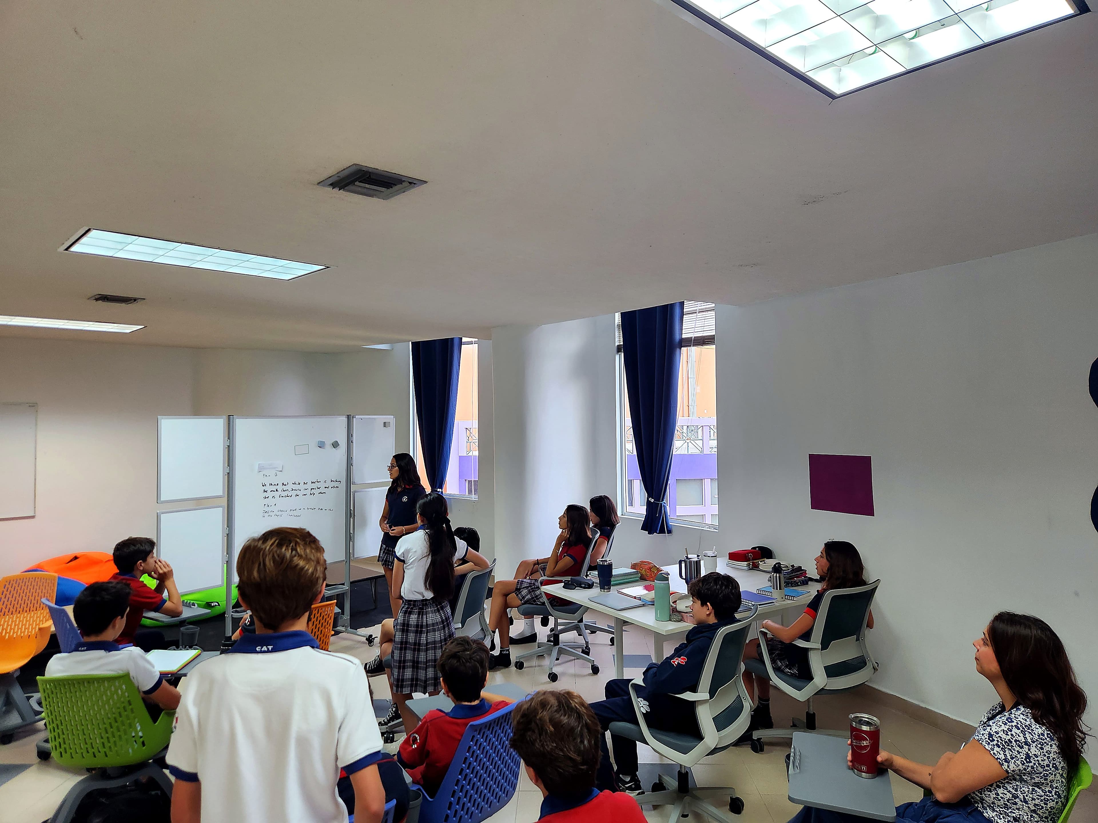 Quantum students listening during a classroom discussion