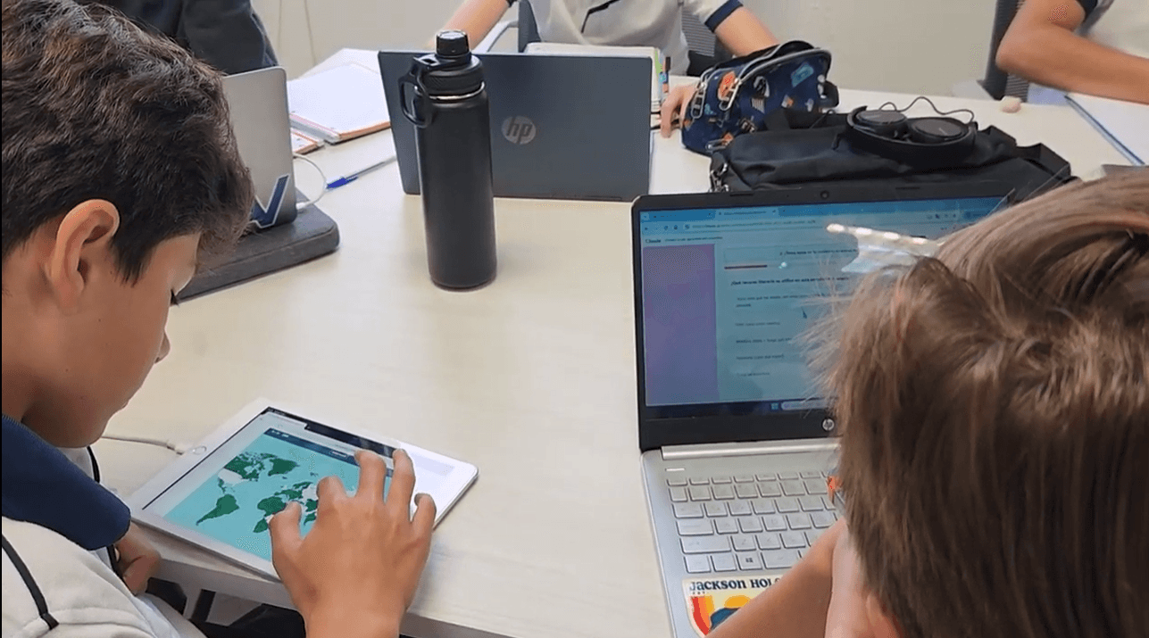 Students using tablets and laptops for interactive learning
